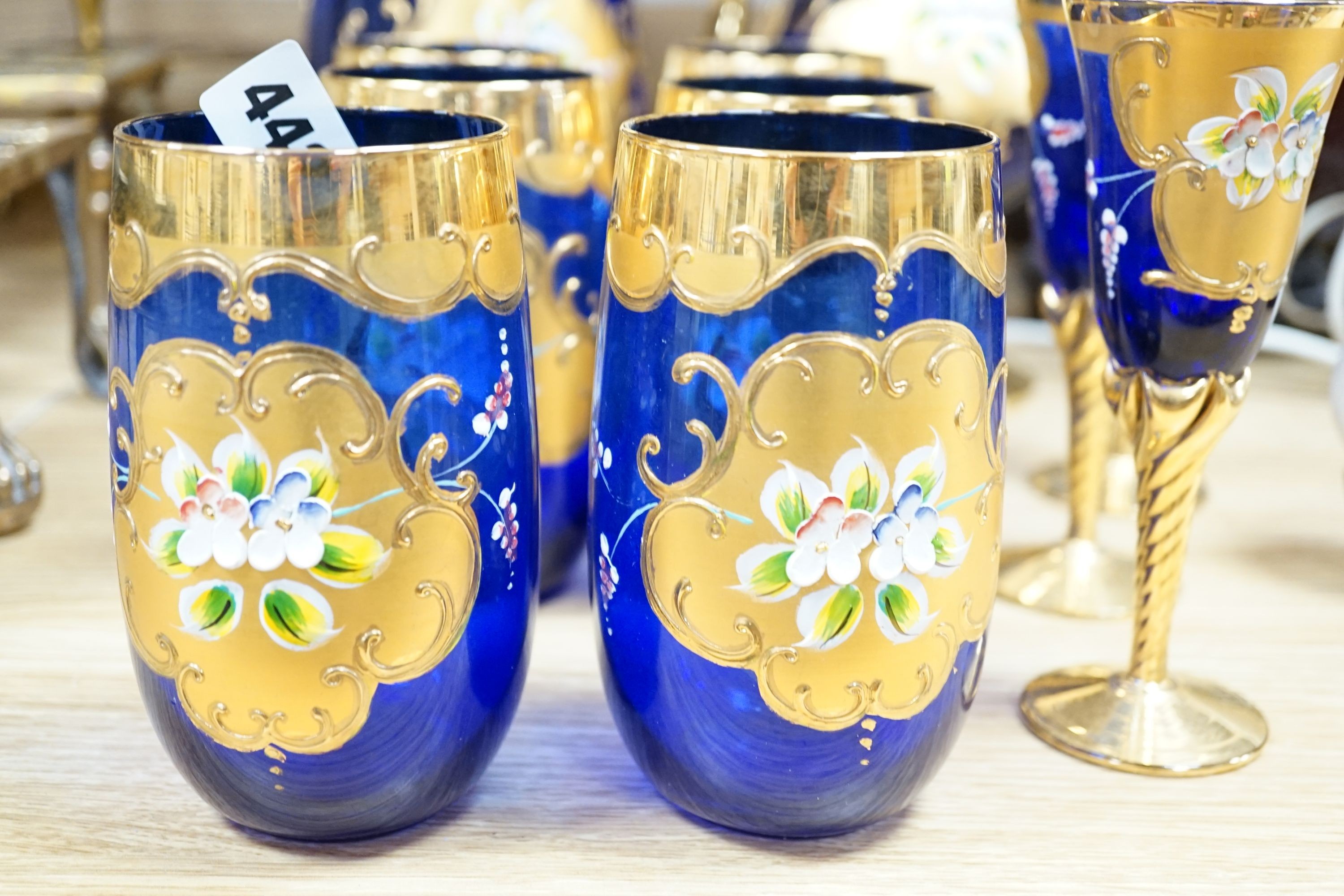 A collection of Venetian coloured and gilded glassware